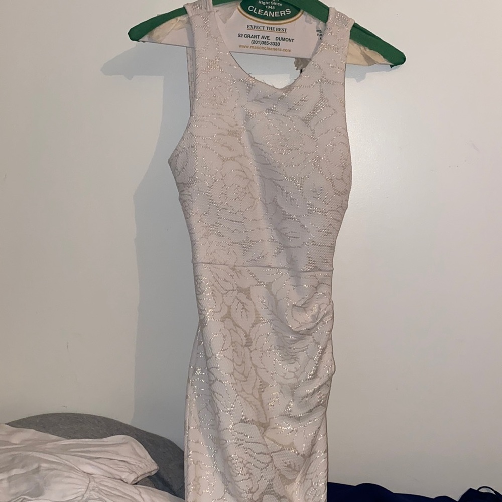 White mini dress with gold detailing